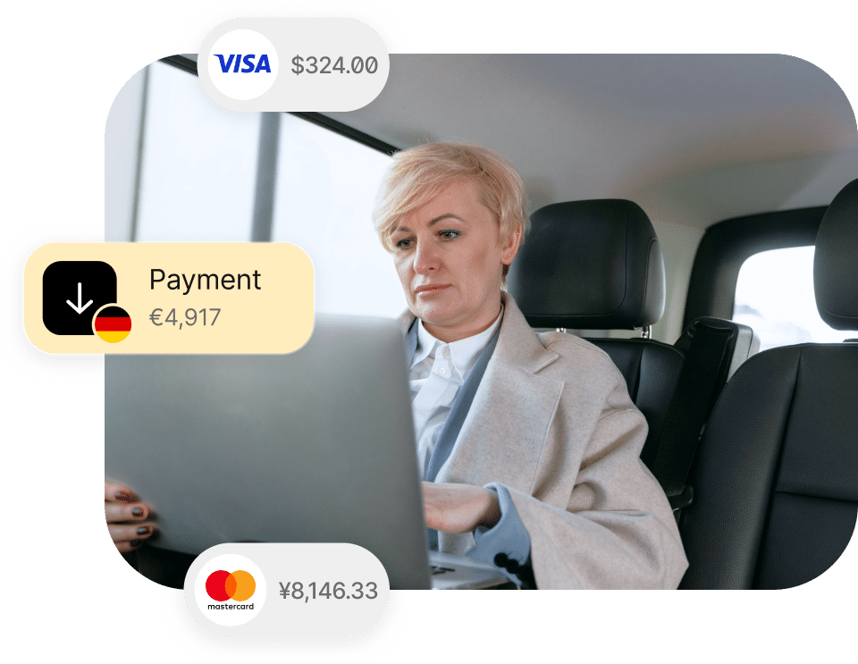 A person in a car works on a laptop. Overlaid text shows payment amounts: €4,917, $324.00, and ¥8,146.33, with Visa and Mastercard icons.