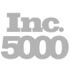 A tree in the foreground against a black background.